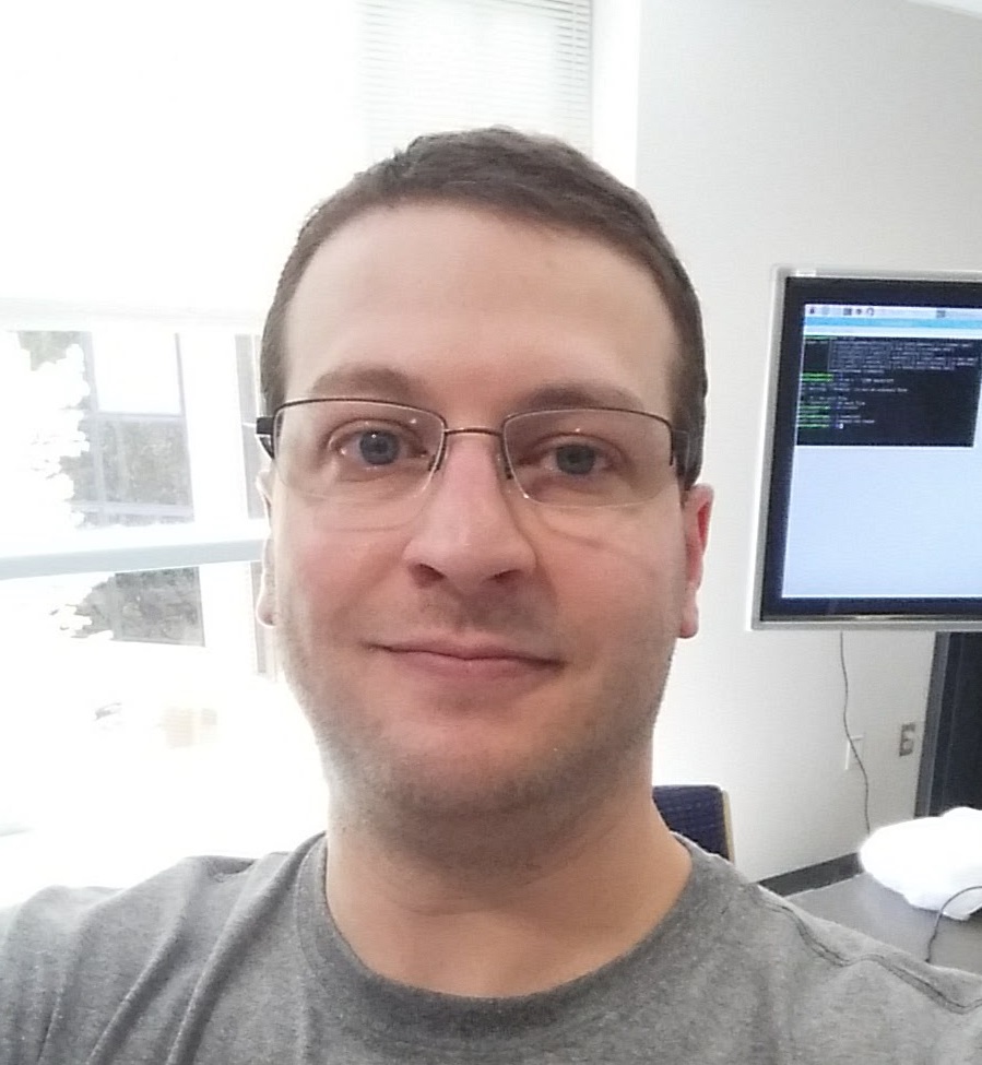 Headshot of Prof. Ryan Ammons